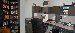 Here is my poor attempt at a panoramic view of my new computer room - the Free Range Command and Control Center (FRCCC).  It is nearly complete - I will add one more small desk where the printer sits on top of a filing cabinet.  It has been a long road full of fornications getting this room the way I want it, but I'm nearly there.  