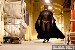New picture from Batman Begins.  Interesting.  I kind of like the costume but I'm confused by the fact that the cape is of such a different color than the cowl and rest of the costume.  