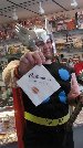 Thor, God of Thunder shows off a number he got during FCBD '08.